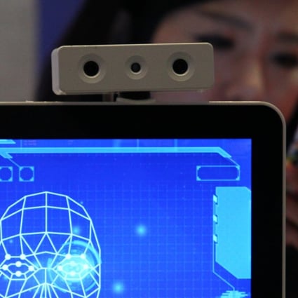 An artificial intelligence system backed by facial recognition which can used in mobile payments is demonstrated at the 3rd World Internet Conference Wuzhen Summit on November 26, 2016. Photo: Simon Song