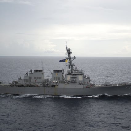 The USS Decatur passed through waters off the disputed Spratly Islands on Sunday, sailing within 12 nautical miles of the Gaven and Johnson reefs during a 10-hour patrol. Photo: AFP