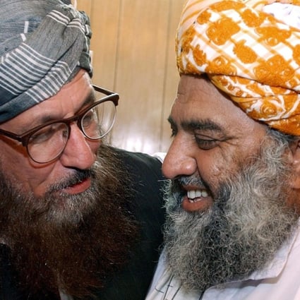 Maulana Samiul Haq (left) talks to Mutahidda Mujlis-e-Amal (MMA) Maulana Fazlur Rehman in Islamabad in 2002. Haq has called for China to help negotiations between Afghanistan and the Taliban. Photo: handout