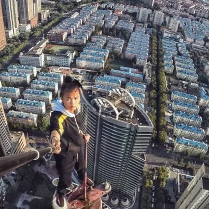 Chinese rooftopping star Wu Yongning posted nearly 300 videos showing his daredevil exploits on buildings across China until he fell to his death from a 52-floor building in Changsha. Photo: 163.com