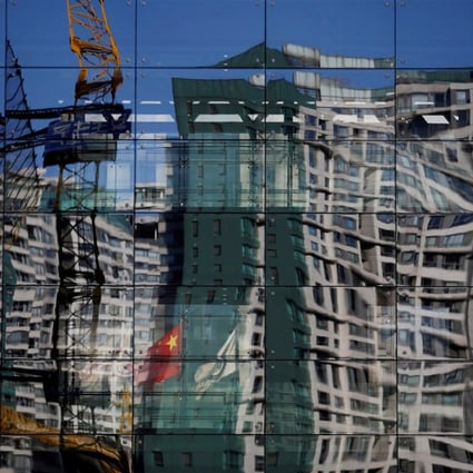 Home ownership is the most important channel of investment for urban households in China, and price cuts have become a cause for social unrest. Photo: Reuters