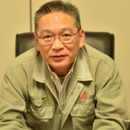 Takashi Ishitani, president