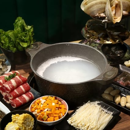 A hotpot with seven types of seafood, beef and vegetables is prepared at Shunde Congee Seafood Hotpot, San Po Kong. Photo: Edmond So