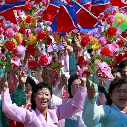 North Koreans cheer during a parade celebrating National Day and the 70th anniversary of the country’s foundation, in Pyongyang, on September 8. While experts have focused on North Korea’s mineral and hydrocarbon resources, nurturing its people may reap better results. Photo: EPA-EFE