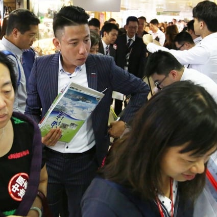 Prospective buyer line up at the sales office of One East Coast on October 12, the first project launch after Chief Executive Carrie Lam Cheng Yuet-ngor’s policy speech. Photo: Edmond So