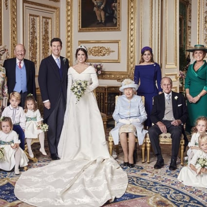 One of the four official wedding photographs released by Buckingham Palace after the wedding of Britain's Princess Eugenie of York and Jack Brooksbank (centre), taken on Friday in the White Drawing Room at Windsor Castle, which also includes (from left, back row) Thomas Brooksbank, the brother of the groom, Nicola and George Brooksbank, the parents of the groom, Eugenie’s sister, Princess Beatrice, and her parents Sarah, Duchess of York and Prince Andrew, and (middle row), Prince George and Princess Charlotte, and Queen Elizabeth and Prince Philip. Photo: Alex Bramall/Buckingham Palace/AP