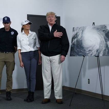 President Donald Trump speaks during a briefing with state and local officials on the response to Hurricane Michael on Monday in Macon, Georgia. From left, Secretary of Agriculture Sonny Perdue, FEMA administrator Brock Long, first lady Melania Trump, Trump, Georgia Agriculture Commissioner Gary Black, and Governor Nathan Deal. Photo: AP