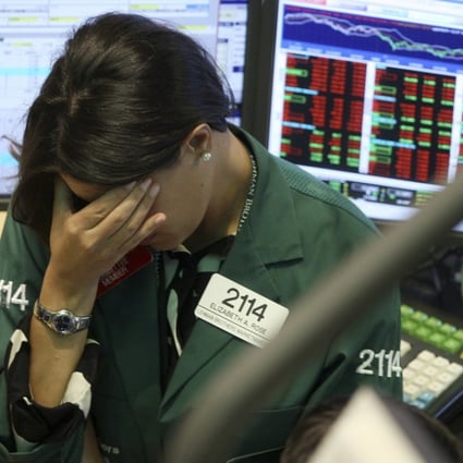 A specialist with Lehman Brothers MarketMakers reacts to the fallout from Lehman Brothers declaring bankruptcy on September 15, 2008, as panic began to spread through the financial system, leading to the Great Recession. Photo: AP