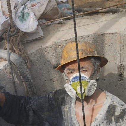 Zhong Pingxie, pneumatic drilling worker, from Sangzhi. Photo taken in 2009 Photo: Handout