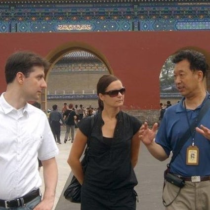 An Imperial Tours guide leads travellers through Beijing. Photo: Imperial Tours