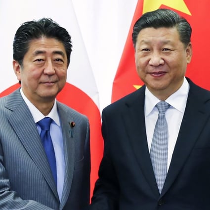 The visit of Shinzo Abe (left) is to feature meetings with Chinese leaders including President Xi Jinping. Photo: AP