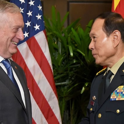 US Secretary of Defence James Mattis shakes hands with China’s General Wei Fenghe during a bilateral meeting in Singapore on Thursday. Both defence chiefs endorsed the non-binding guidelines. Photo: EPA-EFE