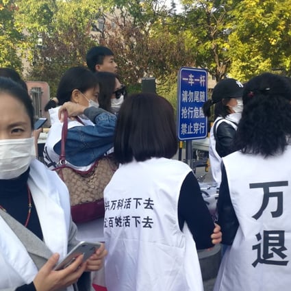 Protestors demanding they wanted to return their properties to Vanke, outside the company’s headquarters in Beijing last week. Photo: Yangpeng Zheng