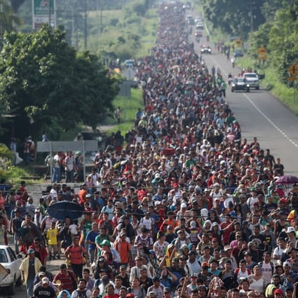 A caravan of thousands of migrants from Central America walk towards Tapachula from Ciudad Hidalgo while en route to the United States. Photo: Reuters