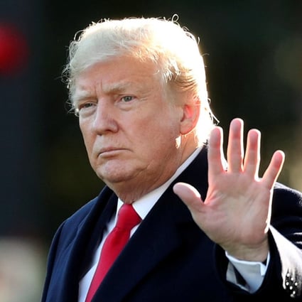 US President Donald Trump waves before leaving the White House for Wisconsin, on October 24, to campaign for Republican Senate candidate Leah Vukmir in the midterm elections. Photo: Reuters
