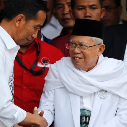 Indonesian President Joko Widodo with his vice-presidential running mate for the 2019 presidential election Islamic cleric Ma'ruf Amin in Jakarta. Photo: Reuters