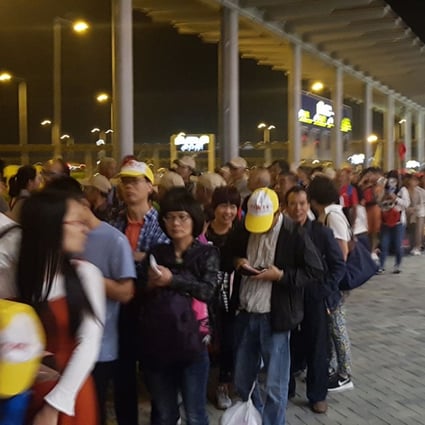 Travellers stand in long lines at the Hong Kong port while waiting for buses to Zhuhai and Macau on Sunday October 29, 2018. Photo: Danny Mok