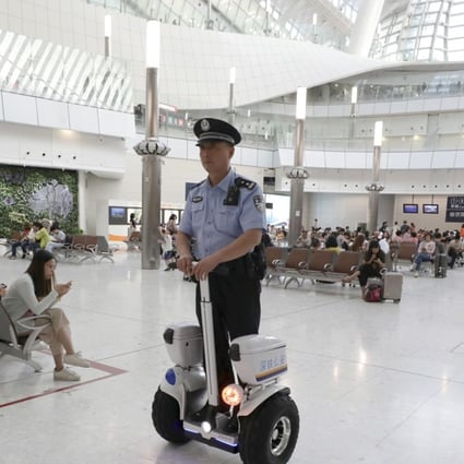 A mainland police officer at the express rail link’s West Kowloon station. Photo: Felix Wong