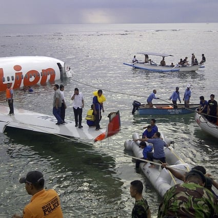 Indonesia's National Rescue Team at the crash site of a Lion Air plane in Bali, in 2013. The plane carrying more than 100 passengers and crew overshot a runway and crashed into the sea, injuring nearly two dozen people. Photo: AP