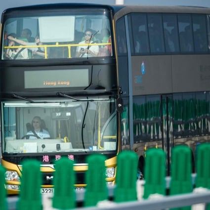 A bus from Hong Kong passes along the Hong Kong-Macau-Zhuhai Bridge on October 24. Photo: AFP