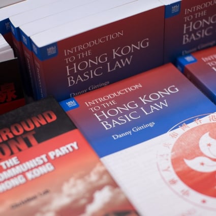 A book published by Hong Kong University Press introducing the Hong Kong Basic Law, the city's mini-constitution, during the Hong Kong Book Fair in July. Photo: EPA-EFE