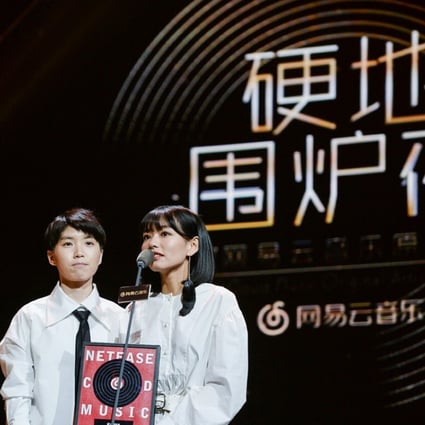 Chinese indie folk duo The Landlord's Cat receives a Best New Artist award from NetEase Cloud Music. Photo: SCMP/Handout