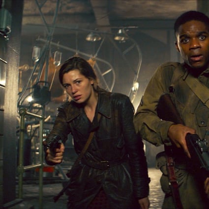 Mathilde Ollivier and Jovan Adepo in a still from Overlord (category III, English, French and German), directed by Julius Avery.