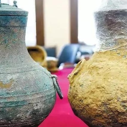 The two bronze wine vessels were found in a tomb believed to date back to the late Western Han dynasty. Photo: Baidu