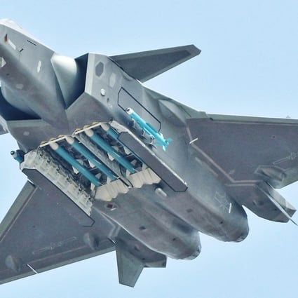 A Chinese J-20 flies with its weapon bays open during the Zhuhai air show. Photo: Weibo