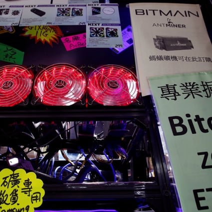 A cryptocurrency mining computer equipped with cooling fans displayed at a computer mall in Hong Kong, May 17, 2018. Photo: Reuters