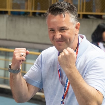 Gary White pumps his fist after Hong Kong reached the EAFF Championship finals in Taipei. Photos: HKFA