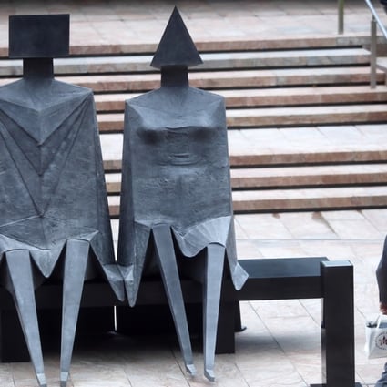 English sculptor Lynn Chadwick’s ‘Sitting Couple’ at Exchange Square in Hong Kong’s Central district. The city remains a very attractive place for companies to go public, according to JPMorgan. Photo: Sam Tsang