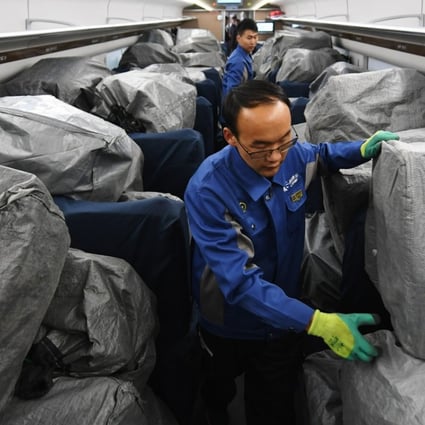 Bundles of parcels wrapped in plastic are stacked on a train at the Lanzhou West Railway Station in Gansu’s provincial capital of Lanzhou on November 11, 2017. A record 1.87 billion parcels will be delivered in the six days following the 2018 Singles’ Day online shopping gala, according to estimates by China’s national postal service. Photo: Xinhua