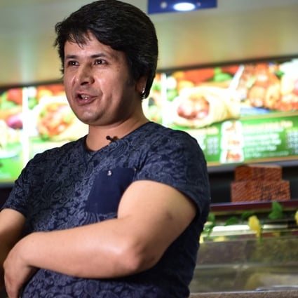 Hazara refugee Ali in his Afghan Friendship Restaurant in Griffith, a tribute to the warm welcome he says he received after moving to the town five years ago. Photo: AFP