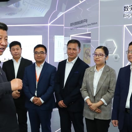 Chinese President Xi Jinping talking with the executives of middle and small-sized private enterprises at an automotive equipment company in Guangzhou on October 24. Photo: Xinhua