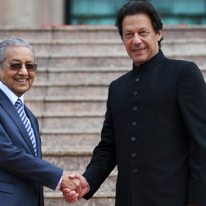 Malaysian Prime Minister Mahathir Mohamad with Pakistani counterpart Imran Khan. Photo: AFP