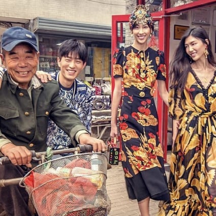 This staged photo, taken from the D&G Instagram site, shows models wearing the brand’s clothing walking through Tiananmen Square in Beijing, interacting with locals. Photo: Handout