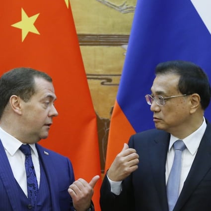 Russian Prime Minister Dmitry Medvedev (left) and Chinese Premier Li Keqiang in Beijing’s Great Hall of the People earlier this month. Photo: EPA