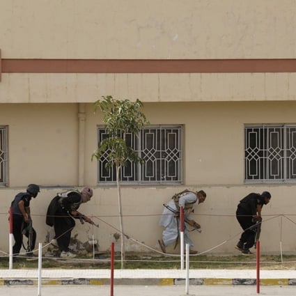 Pakistani paramilitary soldiers take position after militants attacked a hospital in Quetta, the capital of Balochistan province in 2013. Photo: AFP