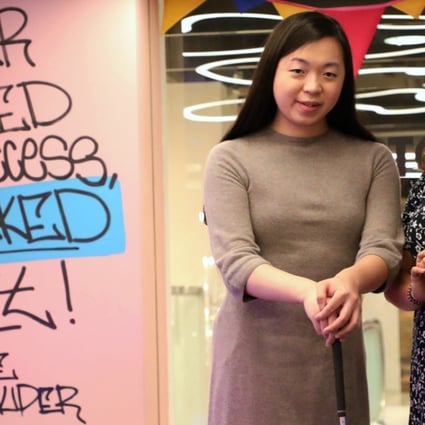 Jane Manchun Wong, 23 year old engineering student from UMass Dartmouth; Post reporter Zen Soo getting in a few rounds of mini-golf before stepping into the podcast studio. Photo: Felix Wong