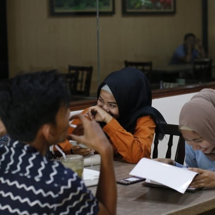 Residents of Aceh province, the only region in Indonesia to impose Islamic law. Photo: AFP