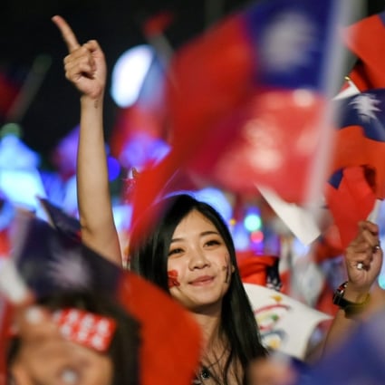 KMT supporters celebrate a series of gains in Saturday’s elections. Photo: EPA-EFE