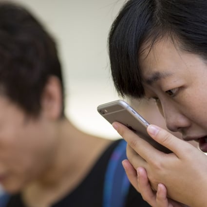 Chinese artificial intelligence company iFlytek is now removing politically sensitive words, phrases and names from its popular translation app, iFlyTranslate. Photo: Bloomberg