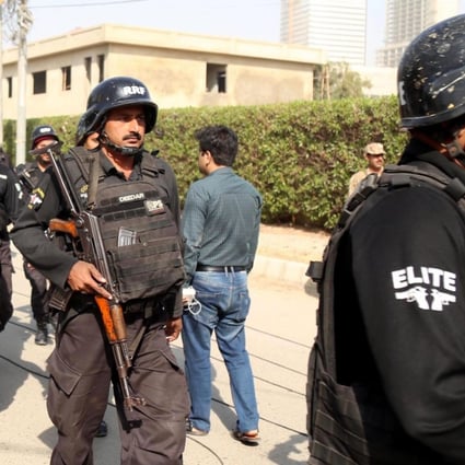 Pakistani security personnel take position near the compound of the Chinese consulate in Karachi after it was stormed in an attack reportedly claimed by the Baloch Liberation Army. Photo: EPA