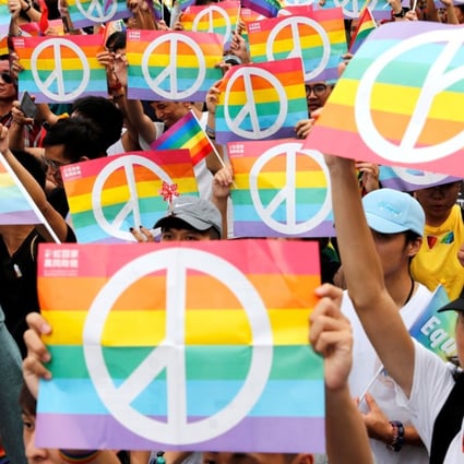 Marriage-equality supporters take part in a pride parade in Kaohsiung, Taiwan, on November 25 after losing the same-sex marriage referendum. Photo: Reuters