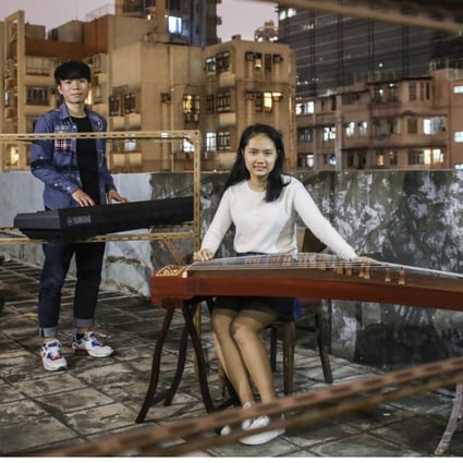Matthew Tsoi (left) and Vicky Lo, two teenagers from poor families who have big music dreams. Photo: Felix Wong