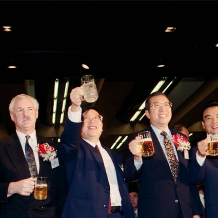 Executives toasting the listing of Tsingtao Brewery on the Hong Kong stock exchange with beer. Tsingtao was the first so-called H share to list in Hong Kong. Photo: SCMP