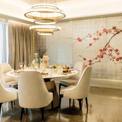Ovo Group’s contemporary, low-slung dining lights allow for plenty of space above for a breezy open feel.