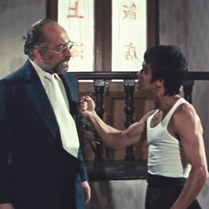 Jon Benn and Bruce Lee in a still from The Way of the Dragon.