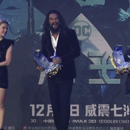 Jason Momoa (centre), Amber Heard and director James Wan at an event in Beijing last month ahead of Aquaman's December world premiere. Photo: AP